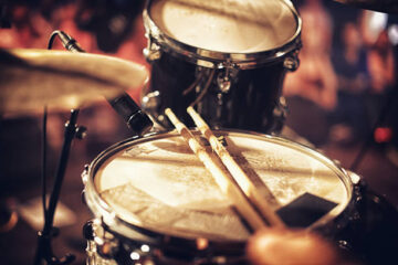 pair of cymbals on a drum set
