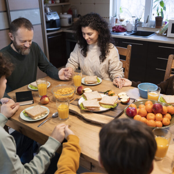 christian family praying together